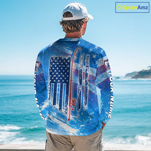 Load image into Gallery viewer, Man on a boat wearing a blue American flag northern pike fishing shirt with custom name on the sleeves