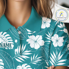 Load image into Gallery viewer, Teal golf polo shirt with white floral and tropical leaf pattern