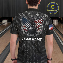 Load image into Gallery viewer, Back view of man wearing a black American flag wings bowling quarter zip shirt in a bowling alley.
