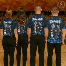 Load image into Gallery viewer, Back view of bowling team wearing matching blue panther bowling shirts in a bowling alley.