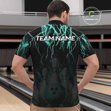 Load image into Gallery viewer, Back view of man wearing a black and turquoise thunder lightning lion quarter zip bowling shirt, bowling league team uniform.