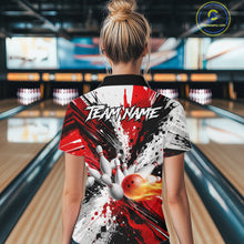Load image into Gallery viewer, Back view of woman wearing a red splatter bowling polo shirt inside a bowling alley.