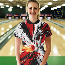 Load image into Gallery viewer, Woman wearing a red splatter bowling quarter zip jersey during bowling league play front view.