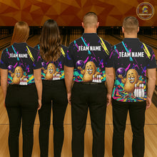 Load image into Gallery viewer, Back view of bowling team wearing matching potato bowling shirts in a bowling alley.
