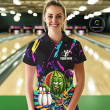 Load image into Gallery viewer, Woman wearing a colorful watermelon bowling polo shirt at a bowling alley front view.