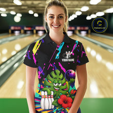 Load image into Gallery viewer, Woman wearing a colorful sunflower bowling polo shirt at a bowling alley front view.