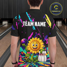 Load image into Gallery viewer, Back view of man wearing a colorful sunflower bowling polo shirt inside a bowling alley.
