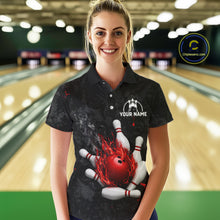 Load image into Gallery viewer, Woman wearing black and red grunge fire bowling polo shirt front view.