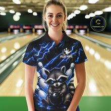 Load image into Gallery viewer, Woman wearing a blue neon lightning raccoon bowling polo shirt at a bowling alley front view.