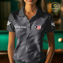 Load image into Gallery viewer, Woman wearing a metal grey American flag 8 ball billiard jersey beside a pool table front view.