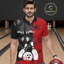Load image into Gallery viewer, Man wearing a black and red raccoon bowling polo shirt at a bowling alley front view.