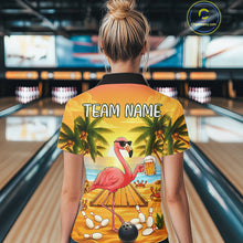 Load image into Gallery viewer, Back view of woman wearing a funny flamingo sunset tropical bowling polo shirt inside a bowling alley.