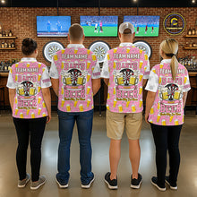 Load image into Gallery viewer, Back view of darts players wearing matching pink and white darts and beer darts shirts.