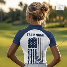 Load image into Gallery viewer, Female golfer wearing patriotic US flag golf sleeveless polo shirt, red white and blue golf apparel, women's golf tournament outfit